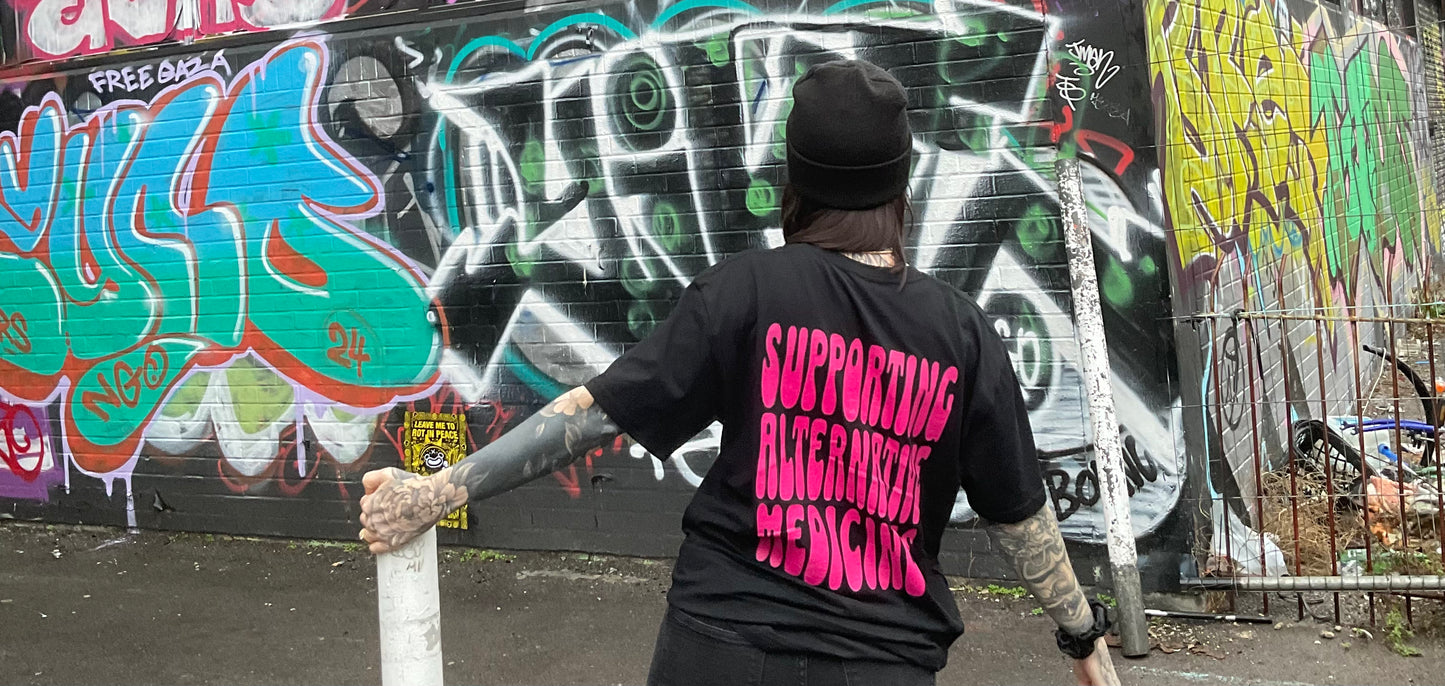 Supporting Alternative Medicines Unisex T-Shirt Pink Print